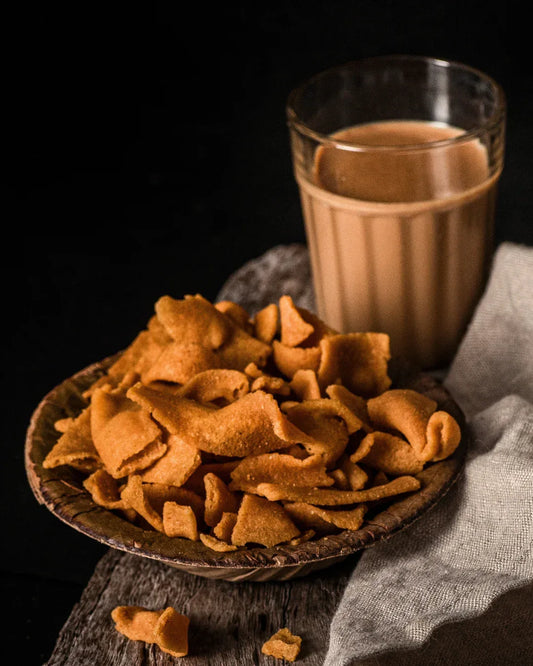 Shiny Sattur sevu kadai seeval served on a leaf in a small bowl