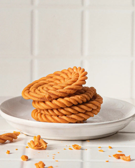 Buy murukku online - displayed beside The Village Bites snack box